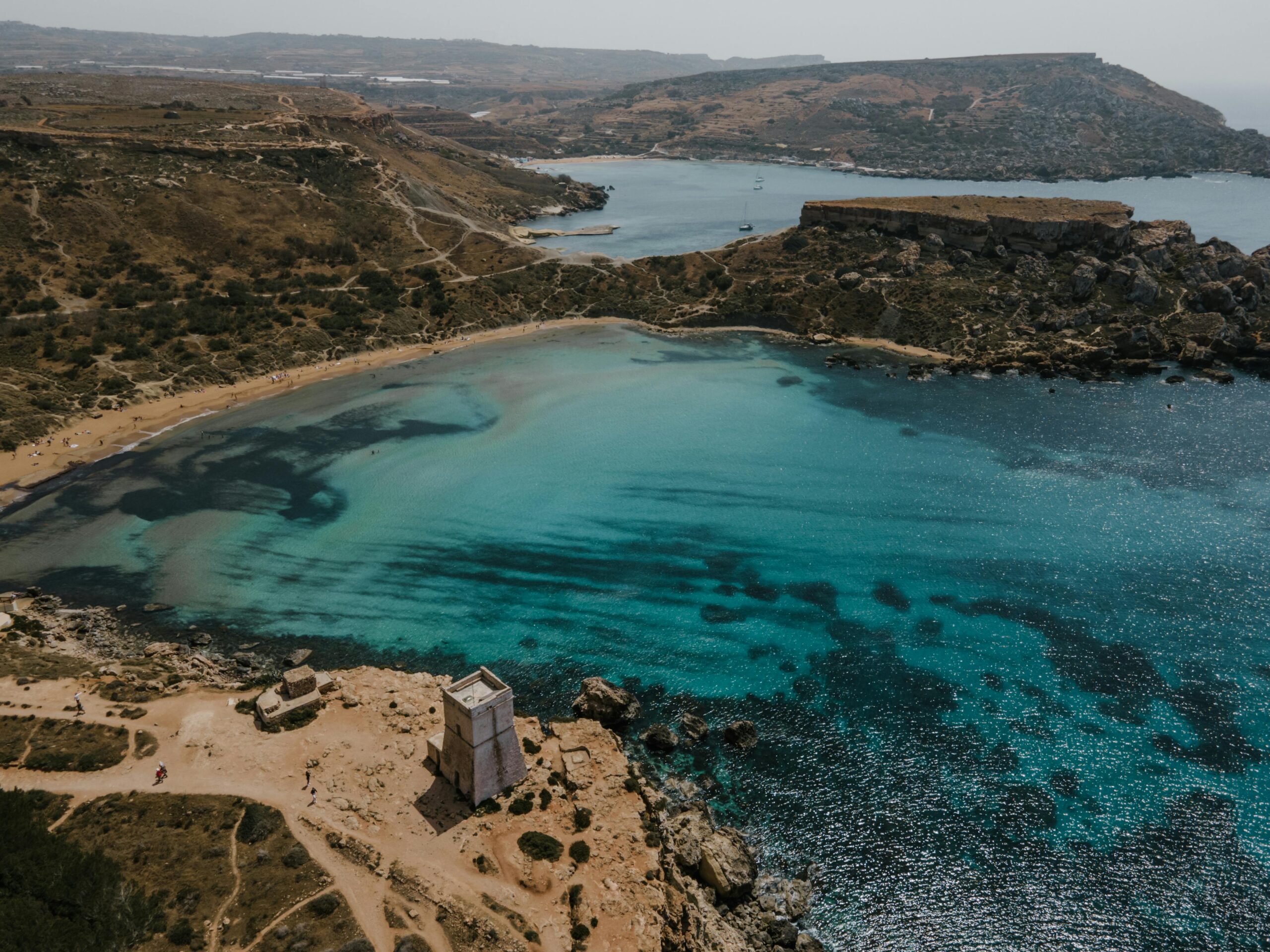 Yacht in the calm waters of St Paul's Bay Malta