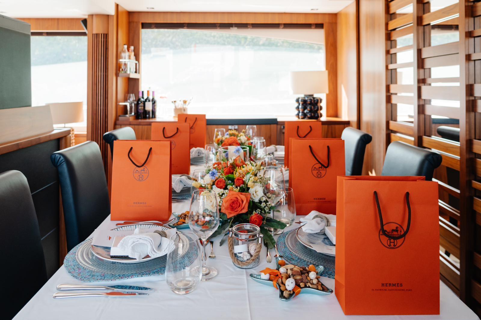 Aft deck dining table set for a private engagement dinner