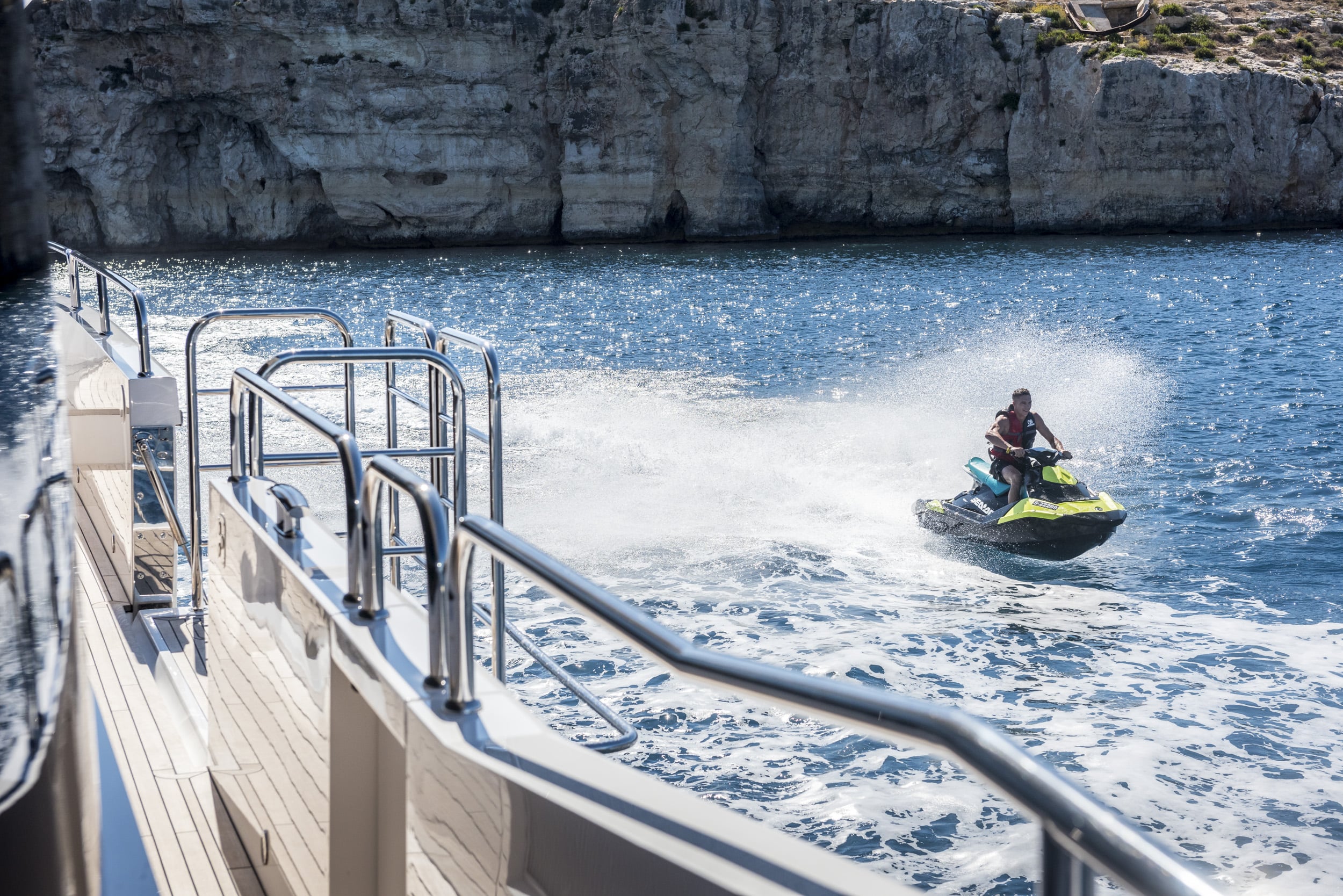Sea-Doo jet ski leaving the swim platform of a yacht in Malta